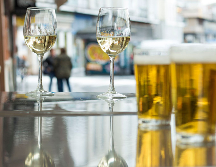 Drinks being poured into glasses